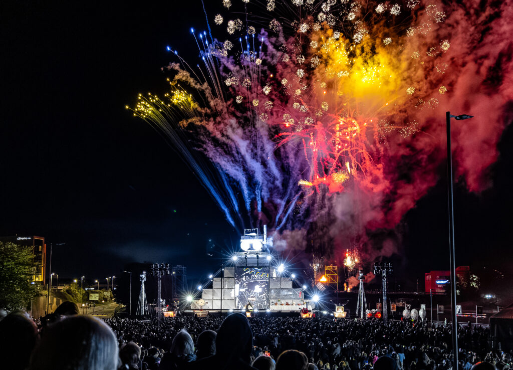 Finale of Ghost Train in Stockton featuring a 12-metre kinetic structure, live music, fire, and projection